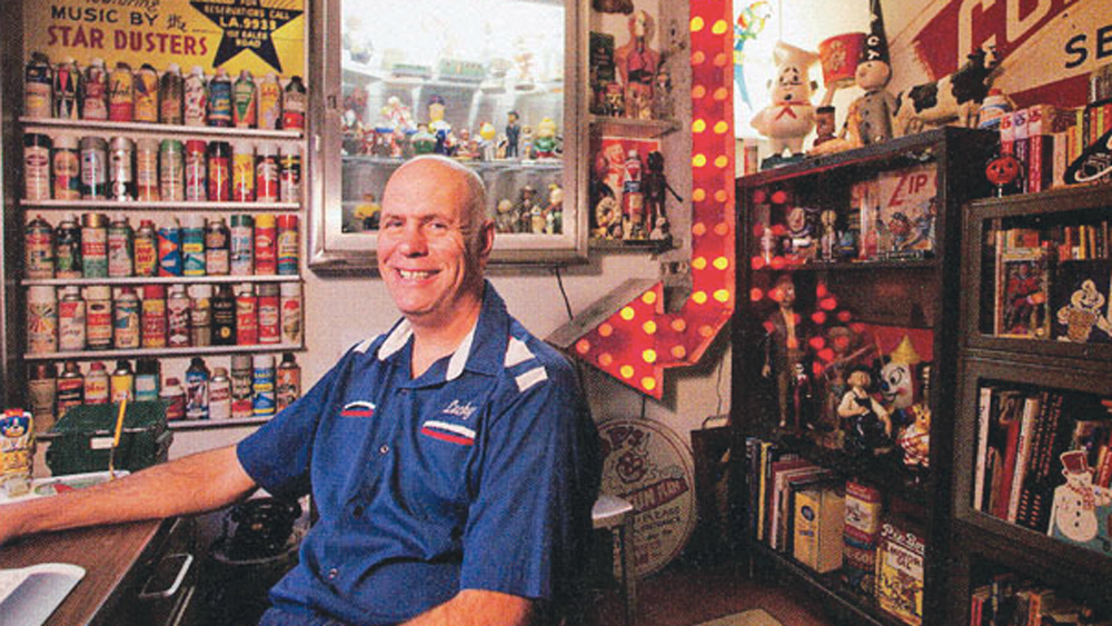 Randy Jones in his home surrounded by his collectibles