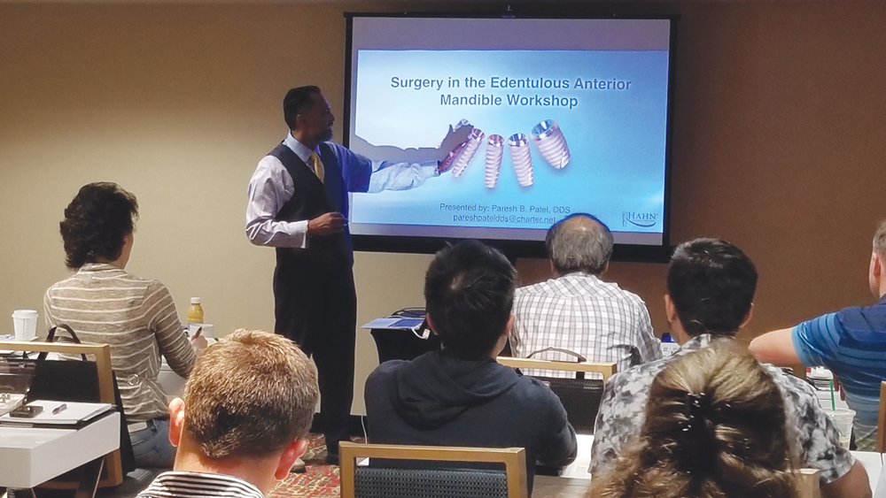 Dr. Paresh Patel presenting at a workshop at the AAID’s regional meeting in Chicago