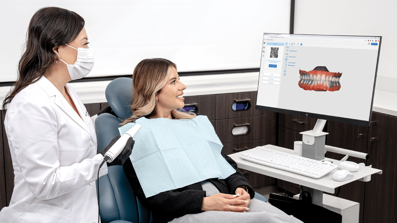 Doctor and patient looking at digital scan 