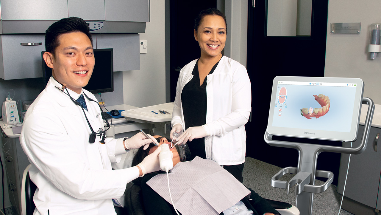 Dr. Chi uses an intraoral scanner to take digital impressions in this 2018 photo. Scanning is a simple way to minimize risk of exposure in the practice.