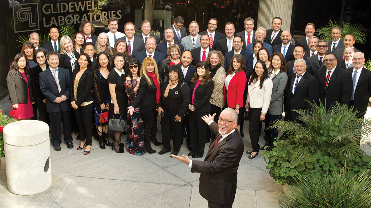 Jim with some of the company’s longest-tenured employees in December 2017.