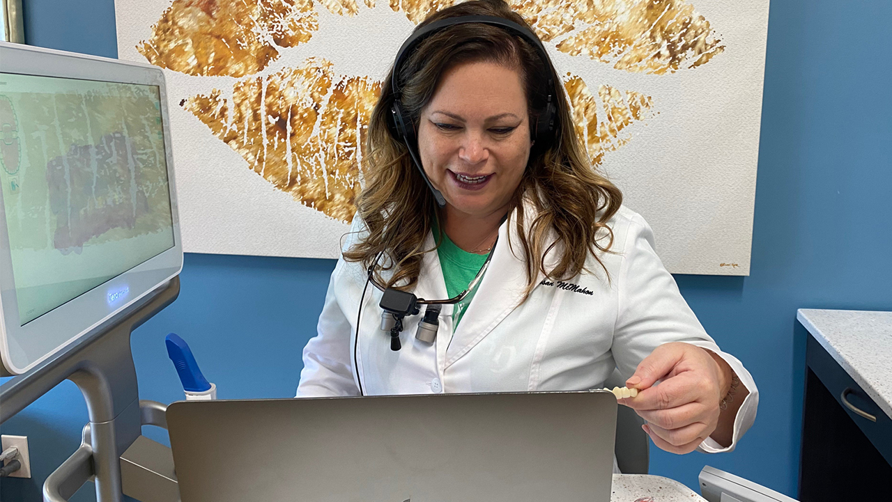 Dr. Susan McMahon providing telehealth consultations to a patient