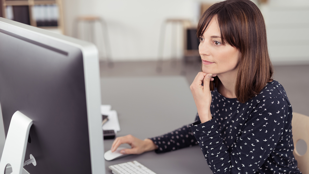 A telehealth patient viewing medical billing on her computer