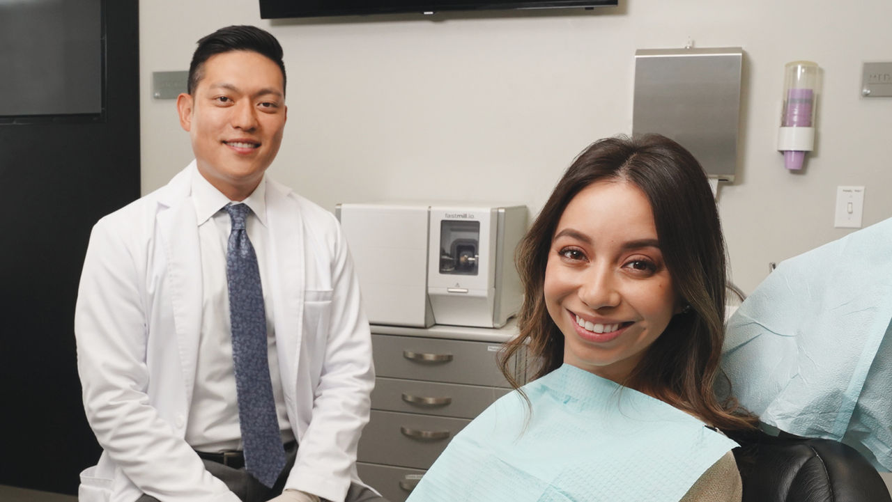 Dr. Chi With Patient