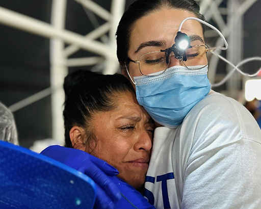 Dentist Hugging Patient