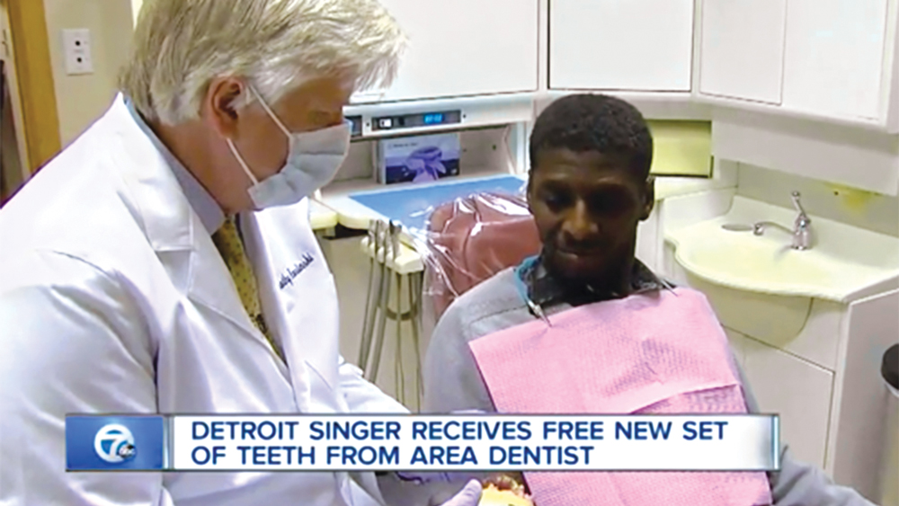 Dr. Kosinski discusses dental treatment with Carl