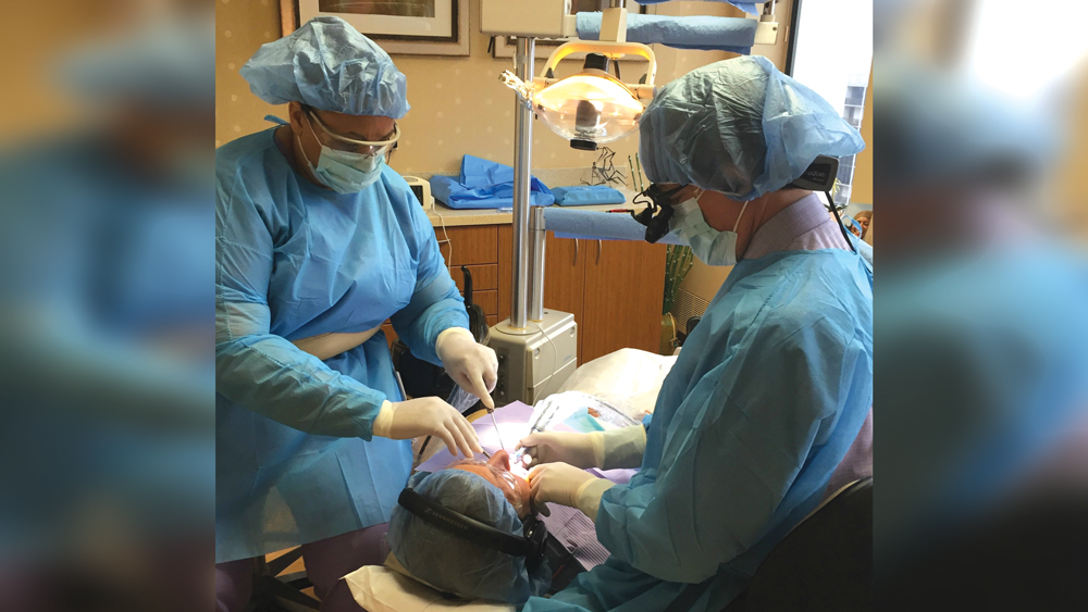 Dr. Hochberg and his technician perform implant restorations on a patient