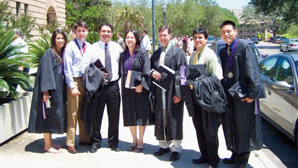 Dr. Justin Chi (far right) when he earned his Bachelor of Science in dental laboratory technology from Louisiana State University Health Sciences Center School of Dentistry