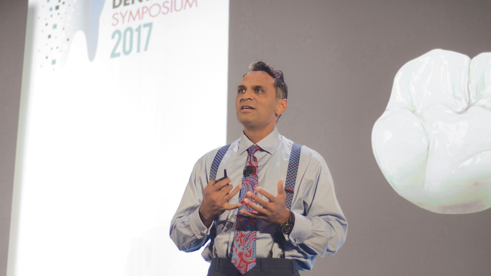 Dr. Patel presenting at the symposium