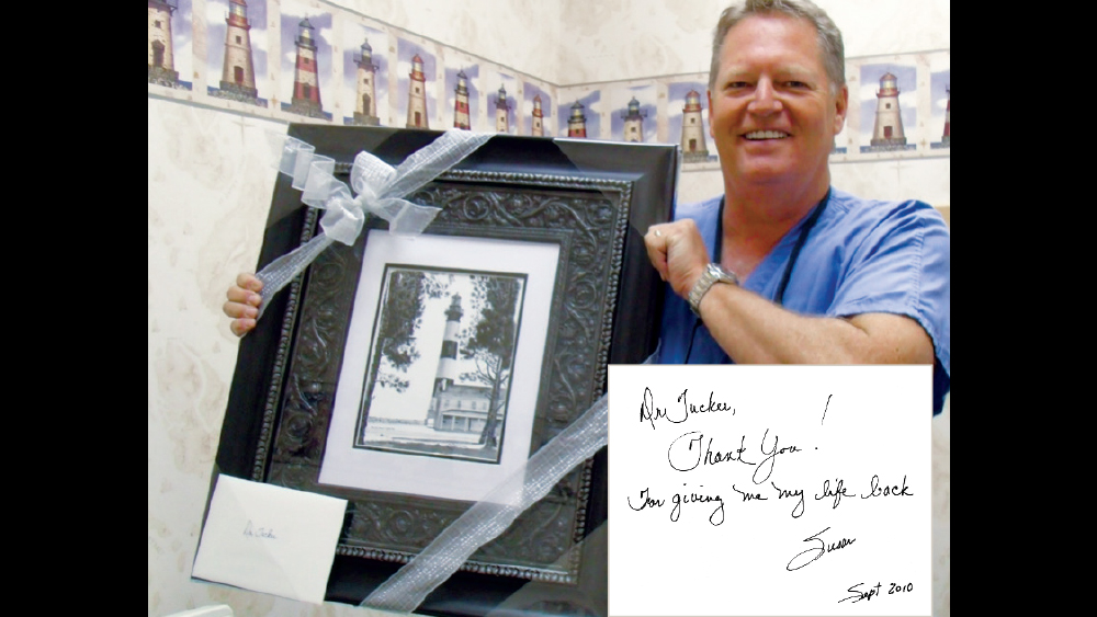 Dr. John Tucker received a framed, original painting from his patient Susan