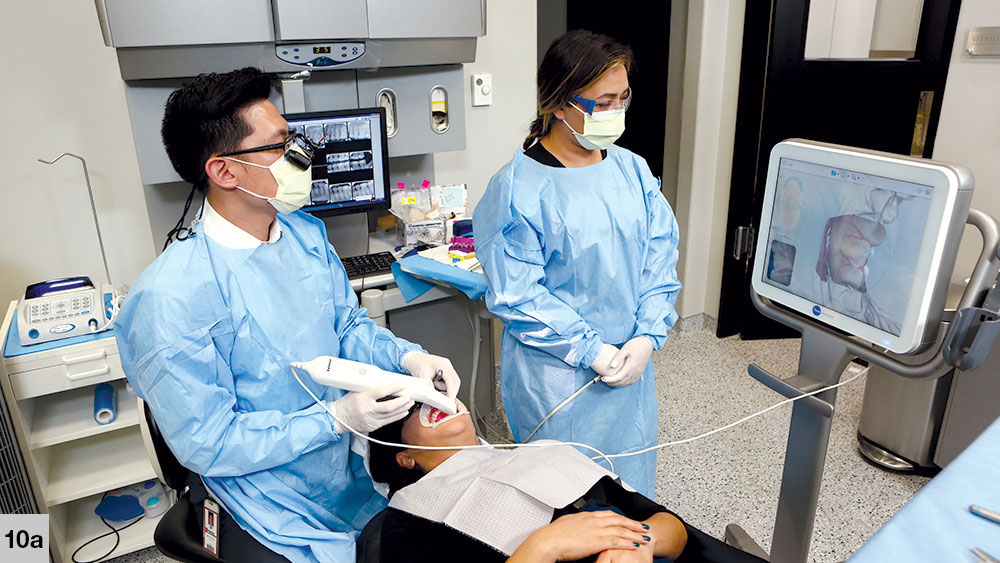 Dr. Chi using iTero Element to scan surrounding structures of patient's mouth