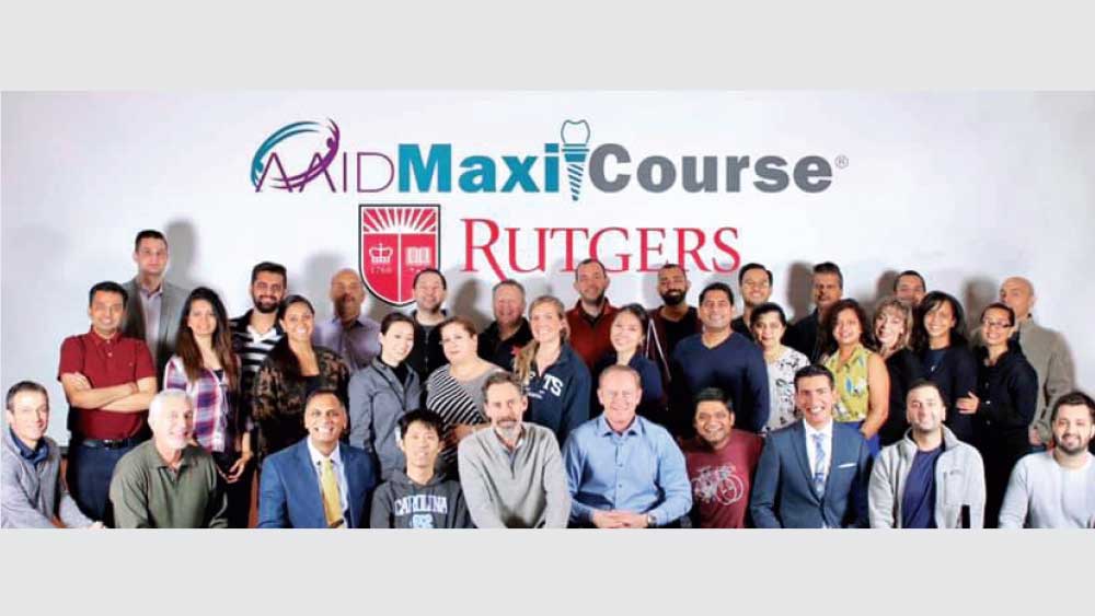 AAID MaxiCourse students gathered together with Course Director Dr. Jack Piermatti and Dr. Paresh Patel