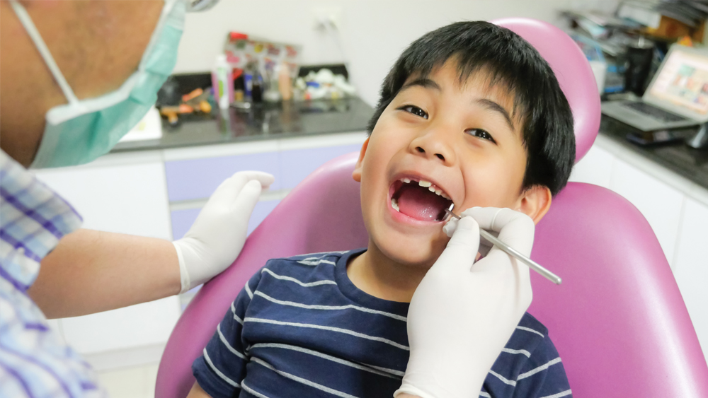 Child getting teeth checked