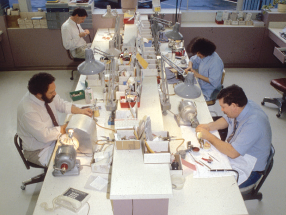 Lab workers creating dental products