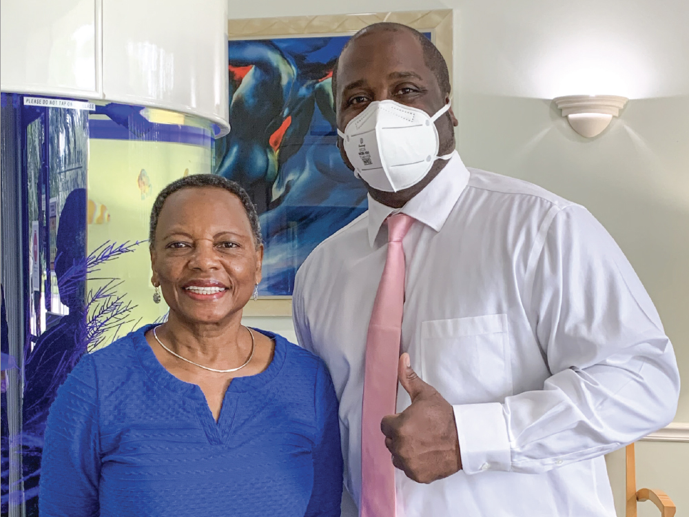 Dr. Jones and woman in blue shirt The Partial-Arch Implant Prosthesis CSMV16I1