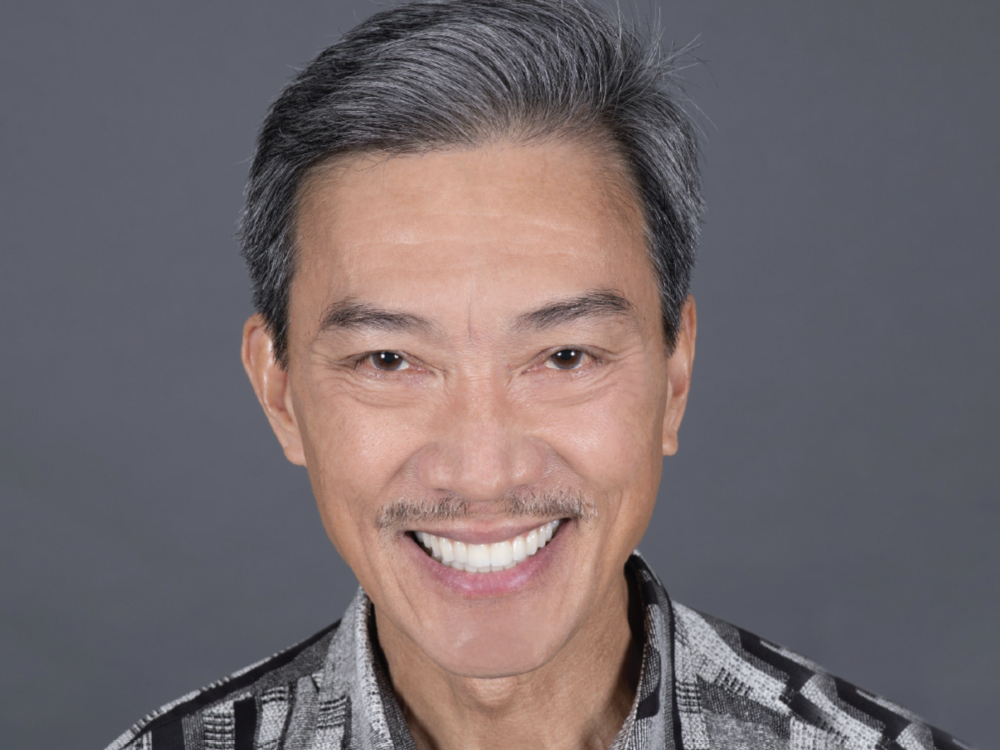 After: Patient with a full-mouth dental restoration