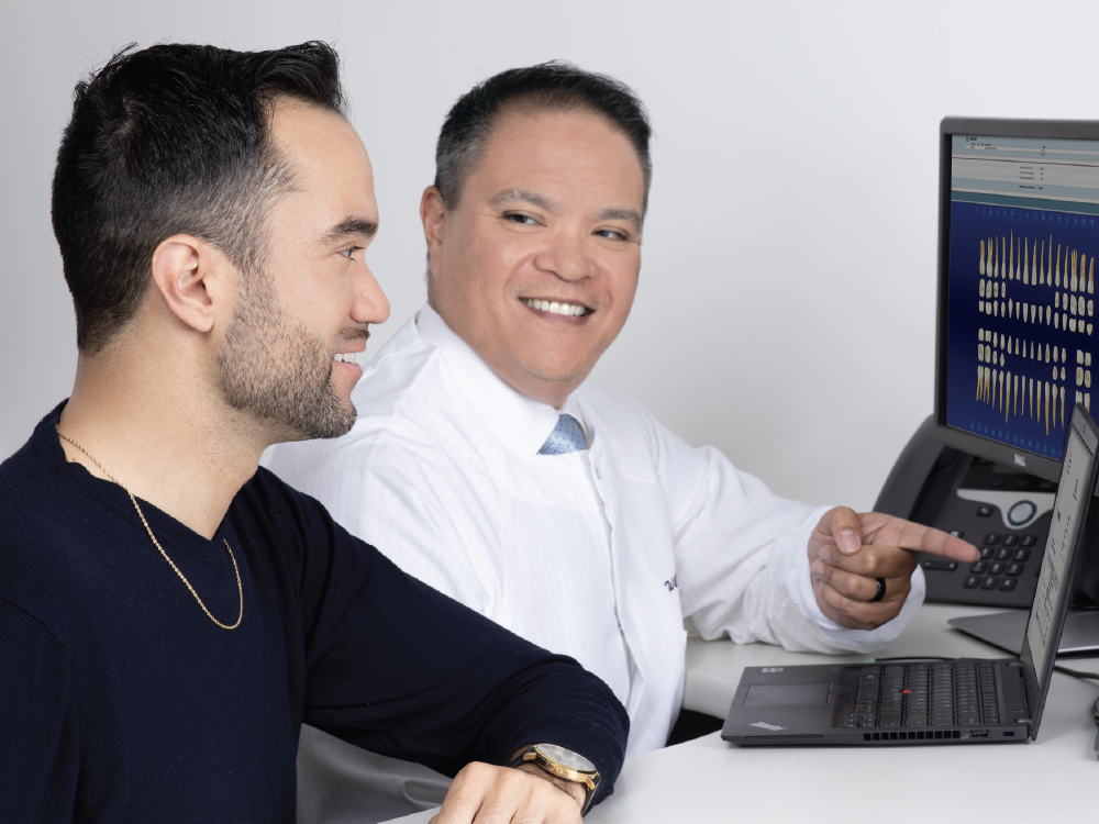 Dentist and patient going over financial options