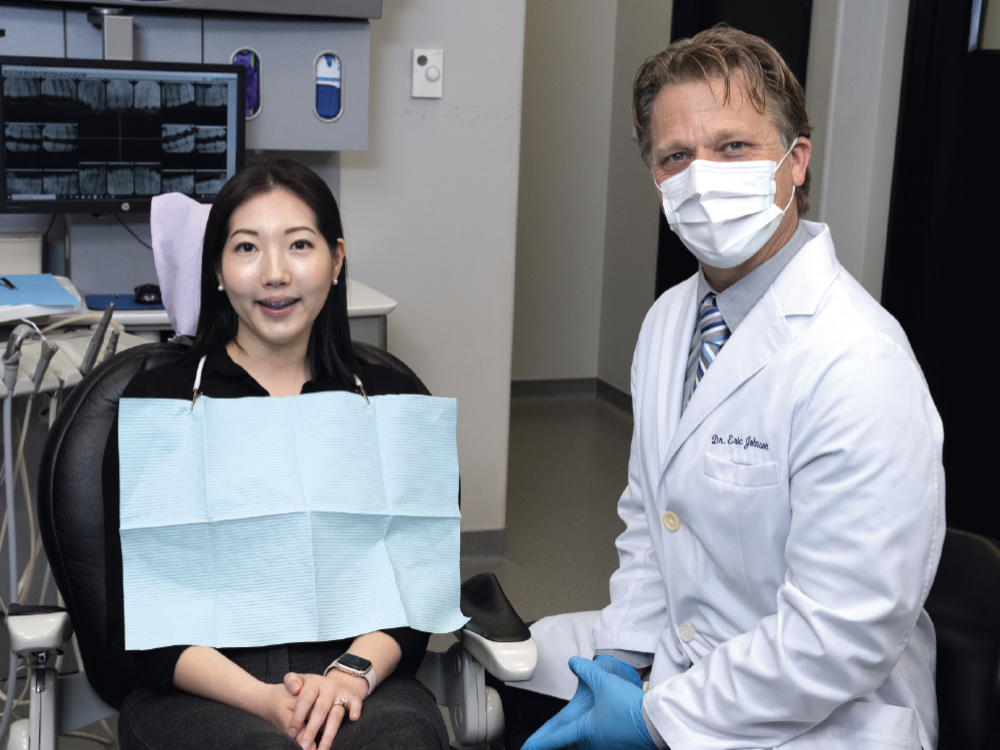 Eric Johnson DDS with patient after NTI Omnisplint treatment