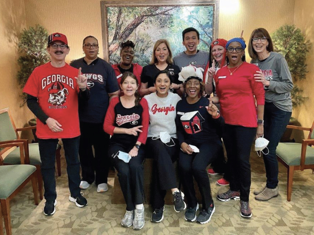 Dr. Hochberg and his staff show their pride for their local com munity by representing the University of Georgia Bulldogs
