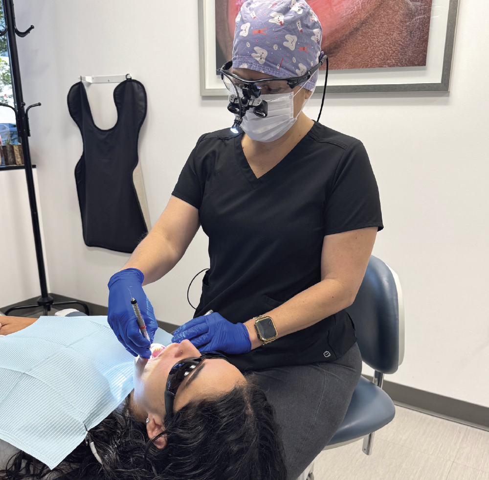 Nikole working on a dental patient 