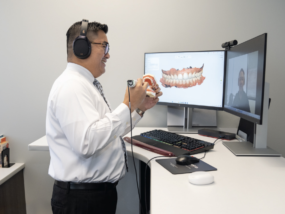 Digital Adoption Manager Yves Cuaton assists a new glidewell.io  user with a virtual demonstration of a fastscan.io™ intraoral scanner
