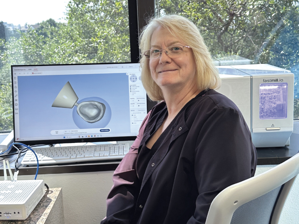 Dr. Lan Chi Le emphasizes comprehensive patient care at her practice — an approach made possible by providing high-quality restorations, utilizing the glidewell.io™ In-Office Solution, and with the assistance of office staff like Kelly (pictured).