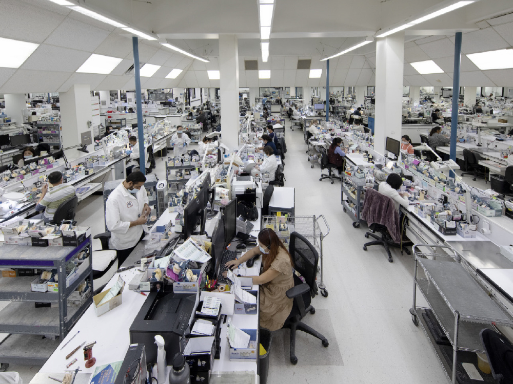 Employees working at the dental lab