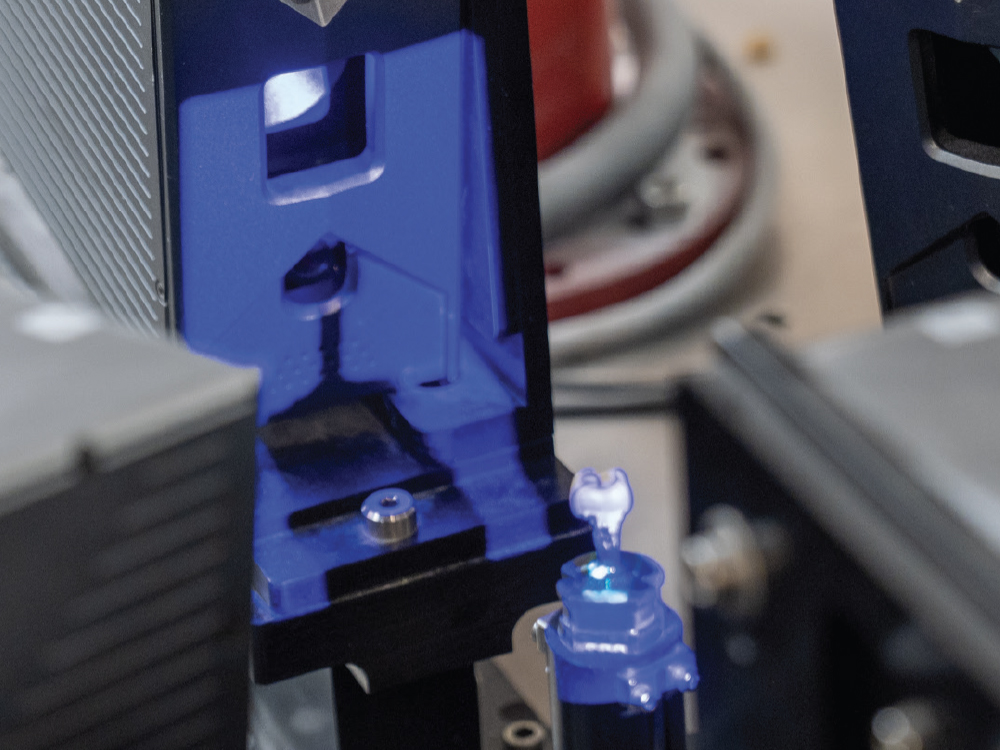 Close-up of laboratory equipment with blue light