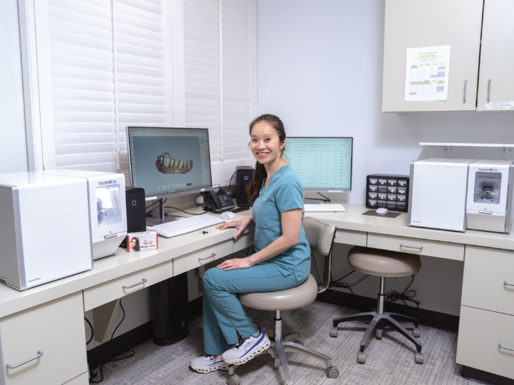 Dental technician in modern lab workspace