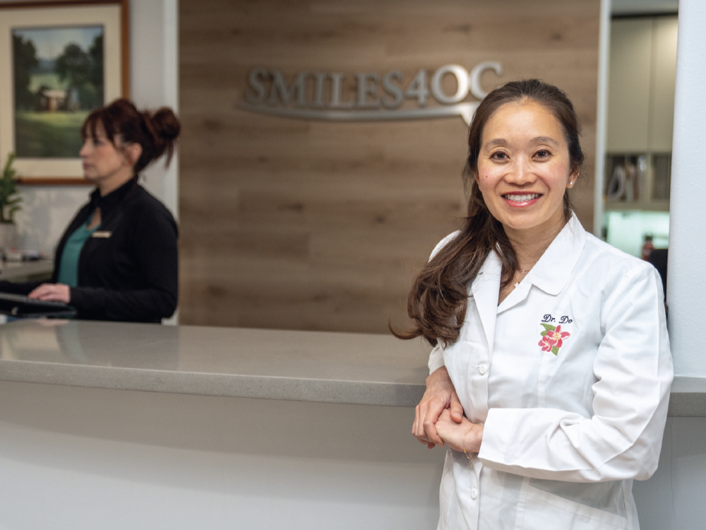 Dental clinic reception with staff in uniform