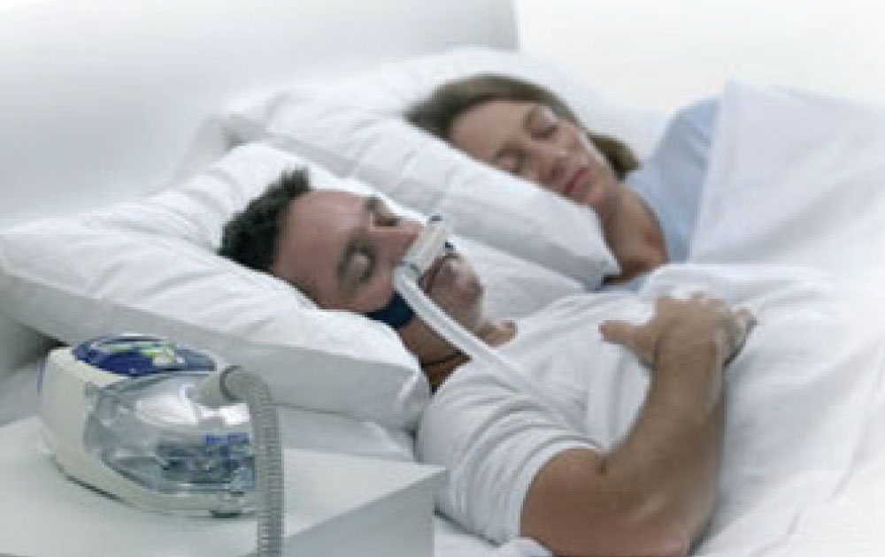 Patient using CPAP device