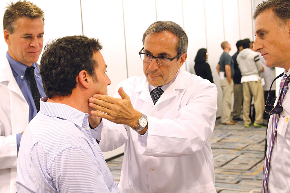 Dr. Malmacher and other dentists review patient's facial structure