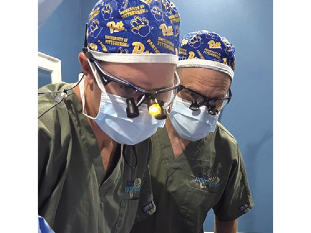 Drs. Randolph and Christopher Resnik work together to advance implantology. 